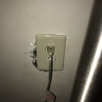 Quality Inn & Suites - Electrical outlet surrounded by mold and dripping water from it - Hotels Near Me - Rockingham, North Carolina Quality Inn & Suites - Electrical outlet surrounded by mold and dripping water from it - Hotels Near Me - Rockingham, North Carolina