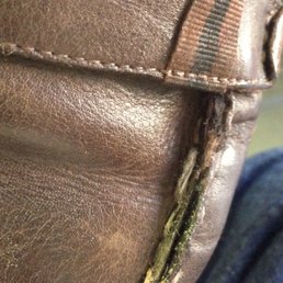 This is how he "repaired" my shoe: by carelessly adding glue.