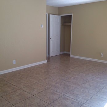 Arbors At Magnolia - Living room with a storage closet. - Apartments Near Me - Anaheim, California