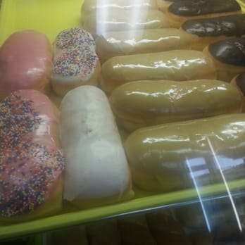 Donut Paradise - a variety of donuts in a display case - Donuts Near Me - Argyle, Texas Donut Paradise - a variety of donuts in a display case - Donuts Near Me - Argyle, Texas
