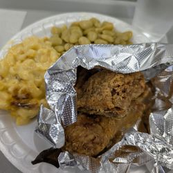 Fried chicken flight with macaroni and cheese and lima beans