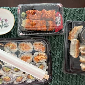 Bento-Ya - Fire roll (top), 3 rolls in bottom left, and gyoza (pork) on right, with my dish (top left) - Sushi Bars Near Me - Webster, New York Bento-Ya - Fire roll (top), 3 rolls in bottom left, and gyoza (pork) on right, with my dish (top left) - Sushi Bars Near Me - Webster, New York