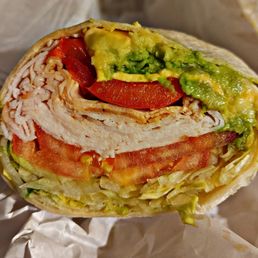 Turkey Wrap with Lettuce, Tomato, Avocado & Roasted Red Peppers. Fantastic and huge! Turkey Wrap with Lettuce, Tomato, Avocado & Roasted Red Peppers. Fantastic and huge!