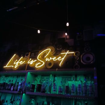 Sweet Caroline Karaoke Bar - Back bar with neon. - Karaoke Near Me - Miami, Florida