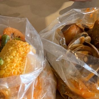 The Captain's Boil - Shrimp with okra and corn. Clams with potatoe and assuage - Cajun/Creole Near Me - Calgary, Alberta The Captain's Boil - Shrimp with okra and corn. Clams with potatoe and assuage - Cajun/Creole Near Me - Calgary, Alberta