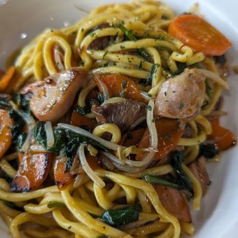Whealthy - Duluth - a plate of pasta with meat and vegetables - Noodles Near Me - Duluth, Georgia