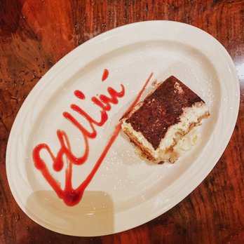 Bellini - Tiramisu -- Three layers of lady fingers soaked in coffee and liqueur, filled with zabaglione cream, topped with grated Belgium Chocolate - Italian Near Me - Philadelphia, Pennsylvania