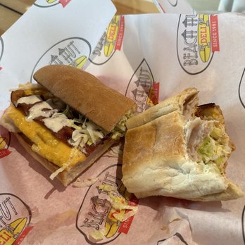 Beach Hut Deli - The photo was an after thought so not a great one.... But the food was really tasty. This is the Spicoli and we also got the Shark Bite. - Delis Near Me - San Clemente, California Beach Hut Deli - The photo was an after thought so not a great one.... But the food was really tasty. This is the Spicoli and we also got the Shark Bite. - Delis Near Me - San Clemente, California