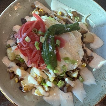 First Watch - Shishito Brisket Hash Blistered shishito peppers and smoked, hand-pulled brisket in a potato hash, topped with two cage-free eggs any style, - Breakfast & Brunch Near Me - Melbourne, Florida