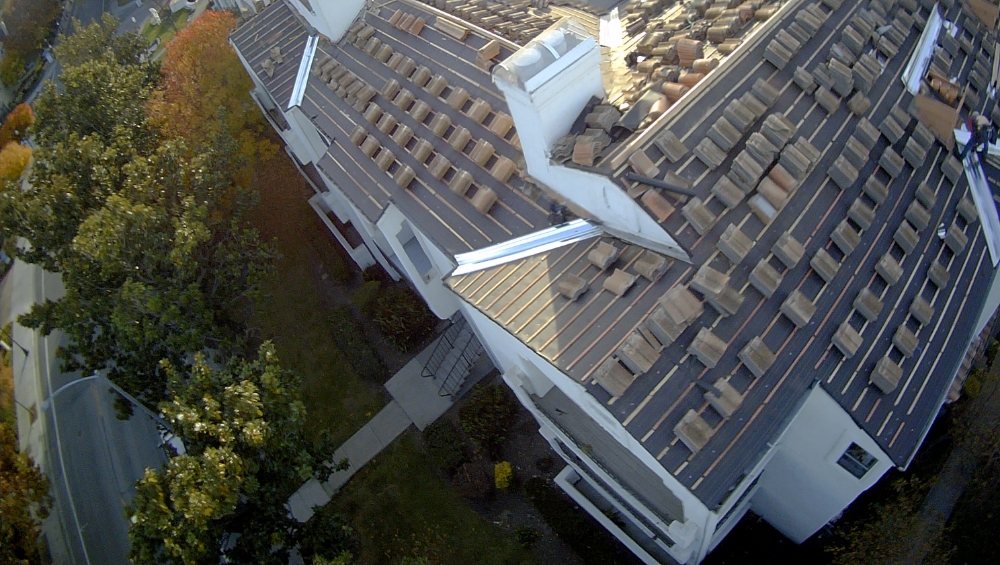 Slide of Julio & Family Roofing