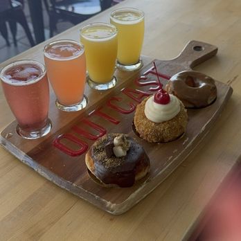 Outcast Doughnuts - Mimosa flight, churro, chocolate glaze & smores - Donuts Near Me - Mesa, Arizona