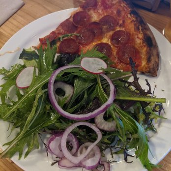 The Wheel Apizza Pub - Salad quite plain. Small pizza slice - Pizza Near Me - Eugene, Oregon