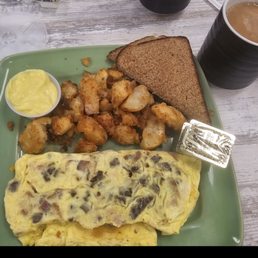 Meat omelet, wheat toast, seasoned potatoes, coffee! Meat omelet, wheat toast, seasoned potatoes, coffee!