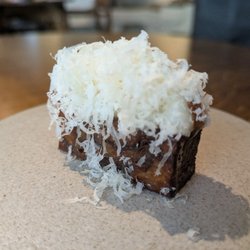 L'Enclume - @endoedibles on Instagram 07/01/26 Corra Linn pudding caramelised in birch sap, Stout vinegar, aged Corra Linn