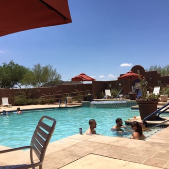 Cocina Cibola - The adult pool area includes table seating for Franciscan Cafe - Juice Bars & Smoothies Near Me - Peoria, Arizona