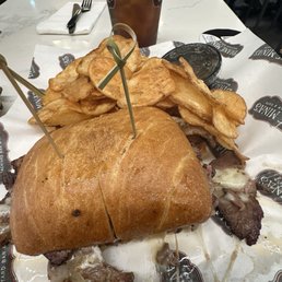Brisket sandwich with potato chips Brisket sandwich with potato chips