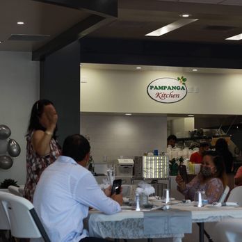 Pampanga Kitchen Waipahu - a group of people sitting at a table - Filipino Near Me - Waipahu, Hawaii Pampanga Kitchen Waipahu - a group of people sitting at a table - Filipino Near Me - Waipahu, Hawaii