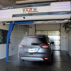 Washing power arm adjusts to car dimensions. 30 HP dryer as you exit.