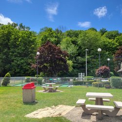 Pro Putt Miniature Golf - Picnic tables near the course and parking lot