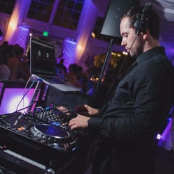 DJ Kryspin at our wedding - two thumbs up