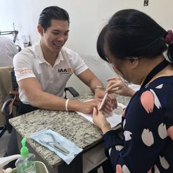 Guys can get manicures too. They had the NFL game on for him