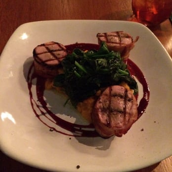 219 Bistro - Dinner Special: Bacon-wrapped Pork Tenderloin with Kahlua Sweet Potatoes, Baby Spinach, and Raspberry/Wine reduction drizzle. - American Near Me - Norfolk, Virginia 219 Bistro - Dinner Special: Bacon-wrapped Pork Tenderloin with Kahlua Sweet Potatoes, Baby Spinach, and Raspberry/Wine reduction drizzle. - American Near Me - Norfolk, Virginia