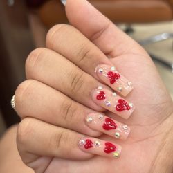 La Nails Spa - My nails she tried to hard to fix all the smuges with stones