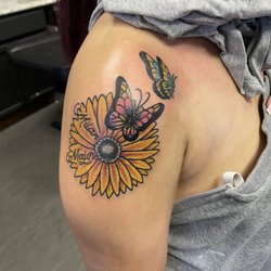 STL Ink 2 - Sunflower with my kids name and two butterflies to represent each of them.