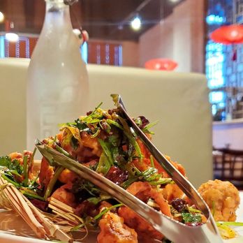 Peter Chang - a plate of food and a bottle of water - Szechuan Near Me - Richmond, Virginia