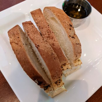 Vici Ristobar - Complimentary bread and herbed oil service. - Bars Near Me - Durham, North Carolina