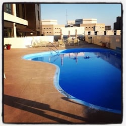 First Place Luxury Apartments - This is the patio pool at First Place Condos.