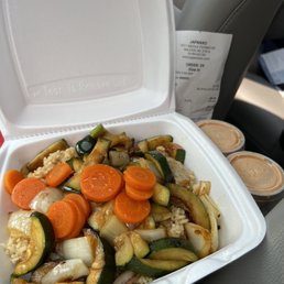 Vegetable Hibachi with fried rice and "white sauce" which is more orange to me but ok. Vegetable Hibachi with fried rice and "white sauce" which is more orange to me but ok.