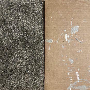 Expert Hom Solutions - It's not even straight when compared to the edge of the cardboard! - Flooring Near Me - Spokane Valley, Washington Expert Hom Solutions - It's not even straight when compared to the edge of the cardboard! - Flooring Near Me - Spokane Valley, Washington