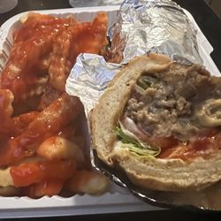 Wonder Chicken - Steak and Cheese Combo. Comes with can soda. Might be $10