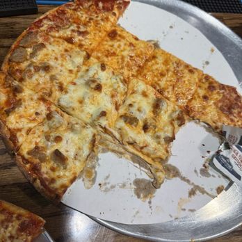 The Brick House - Thin crust cheese and sausage pizza. - Pizza Near Me - Port Clinton, Ohio The Brick House - Thin crust cheese and sausage pizza. - Pizza Near Me - Port Clinton, Ohio