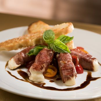 The Capital Grille - Prosciutto-Wrapped Mozzarella with Vine Ripe Tomatoes and served with crisp crostini and 15-year aged balsamic. - Seafood Near Me - Fort Worth, Texas The Capital Grille - Prosciutto-Wrapped Mozzarella with Vine Ripe Tomatoes and served with crisp crostini and 15-year aged balsamic. - Seafood Near Me - Fort Worth, Texas