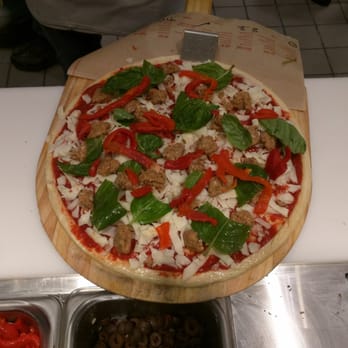 Blaze Pizza - Ready to go in grill, sausage, basil, & red peppers. - Salad Near Me - Royal Palm Beach, Florida Blaze Pizza - Ready to go in grill, sausage, basil, & red peppers. - Salad Near Me - Royal Palm Beach, Florida