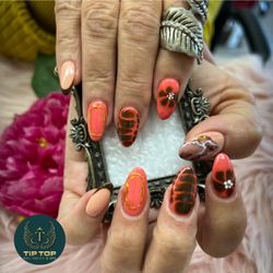 Tip Top Nails & Spa - "Fall Vibes with a Fierce Twist! Leaves, florals & marble magic - all in one glam set."