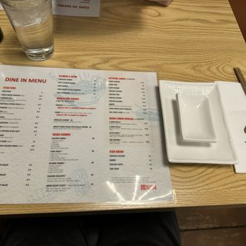 Kazumi Sushi - a menu and a glass of water - Sushi Bars Near Me - Denver, Colorado Kazumi Sushi - a menu and a glass of water - Sushi Bars Near Me - Denver, Colorado