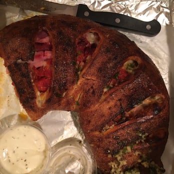 Sicilian Pizza - Calzone (half eaten) - Pizza Near Me - Washington, DC, District of Columbia