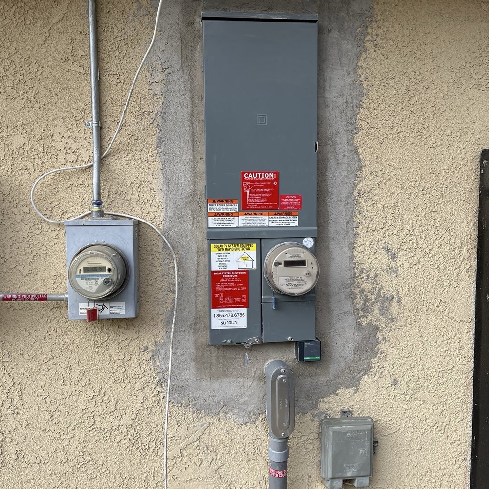 Power Pro's Electric & Solar - New electrical panel and stucco back in its proper place. When it dries Jason will paint it. - Electricians Near Me Power Pro's Electric & Solar - New electrical panel and stucco back in its proper place. When it dries Jason will paint it. - Electricians Near Me