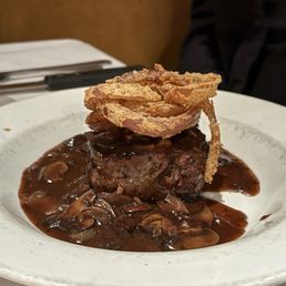 Delicious! Filet, medium rare, onion haystack, merlot mushrooms. (Don't have pic but side of potatoes and veggies just as good) Delicious! Filet, medium rare, onion haystack, merlot mushrooms. (Don't have pic but side of potatoes and veggies just as good)