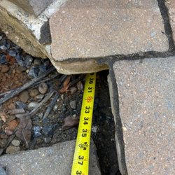 Jay's Outdoor Handyman Service - Same corner, with papers removed showcasing the extent of the erosion