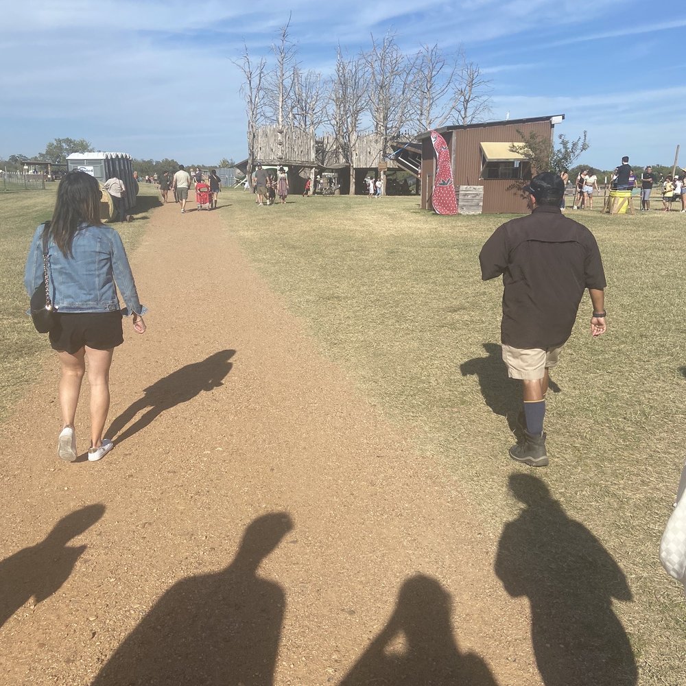 Barton Hill Farms - The security "goblin" escorting my MOTHER to the nasty port o potty. - Venues & Event Spaces Near Me - Bastrop, Texas