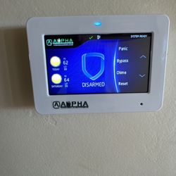 Alpha Technologies & Alarm Systems - Touchscreen interface.