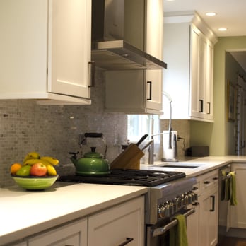 Archetype Design and Construction - went with a marble mosaic backsplash from tile outlet, all appliances from ABT - General Contractors Near Me - Chicago, Illinois