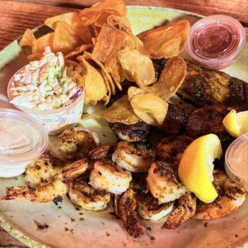 PJ's Oyster Bar - Blackened seafood platter - Seafood Near Me - Indian Rocks Beach, Florida PJ's Oyster Bar - Blackened seafood platter - Seafood Near Me - Indian Rocks Beach, Florida
