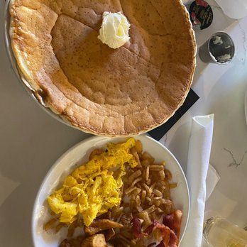 Toast Kitchen & Bar - Giant pancake with scrambled eggs, bacon, and hash browns - Breakfast & Brunch Near Me - Brea, California
