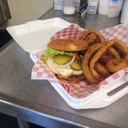 CJ's Grill - Deluxe Burger & Onion Rings.