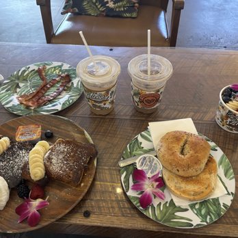 Hawaiian Aroma Caffe - Banana bread French toast, bacon, everything bagel, original açaí bowl (12oz). Cafe mocha iced and caramel macchiato iced. - Cafes Near Me - Honolulu, Hawaii